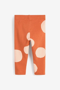 Next All Over Rust Print Baby Girls Leggings - Stockpoint Apparel Outlet