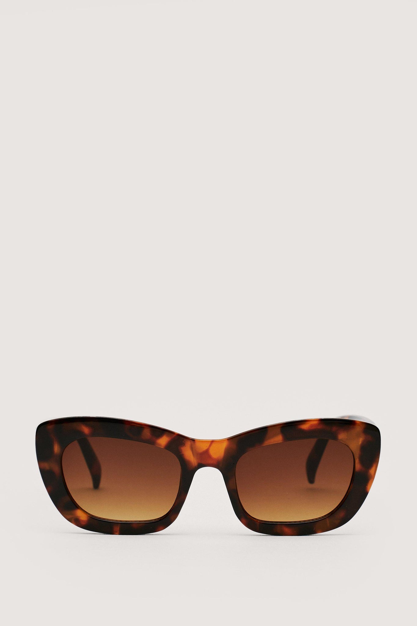 NastyGal Brown Thick Tortoiseshell Cat Eye Womens Sunglasses - Stockpoint Apparel Outlet